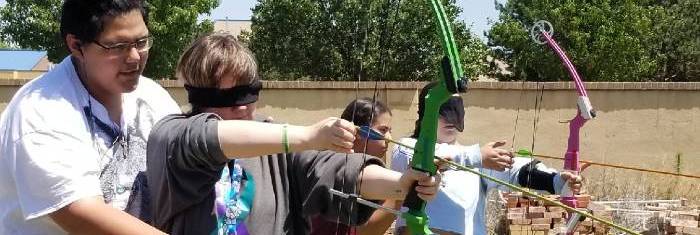 Photo of Kids learning the bow and arrow